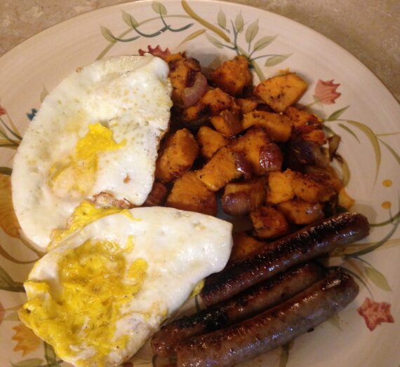 Sweet Potato Hash with Fried Eggs and a side of Maple Breakfast Sausage